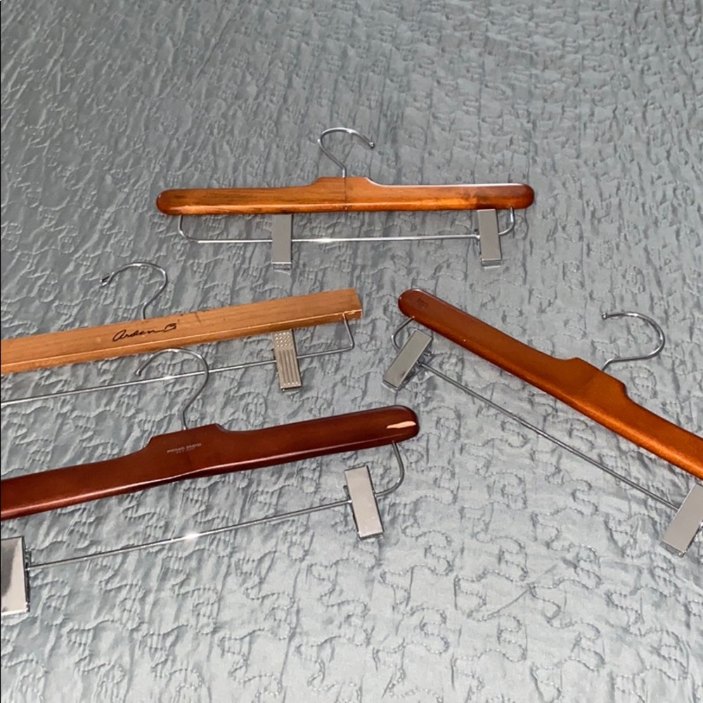 4 Pant hangers. Solid wood. In great shape.